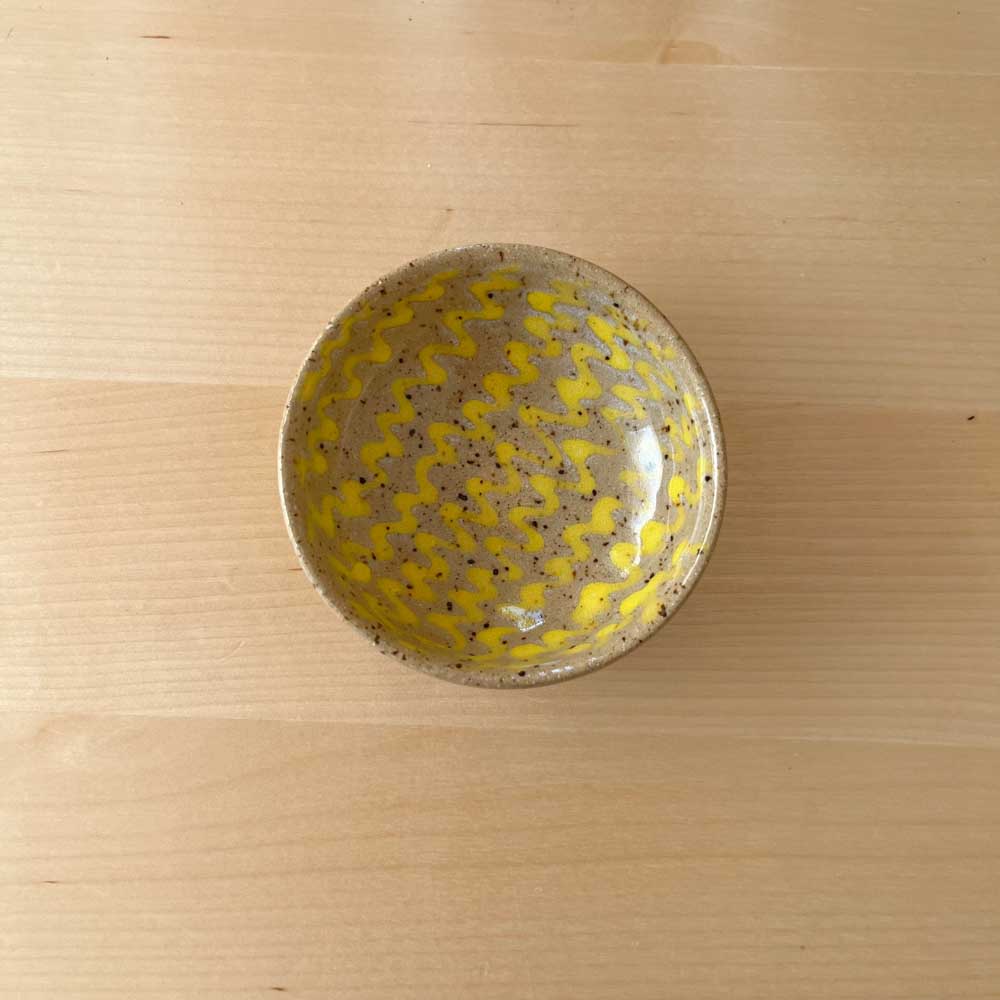 Small bowl with yellow squiggles